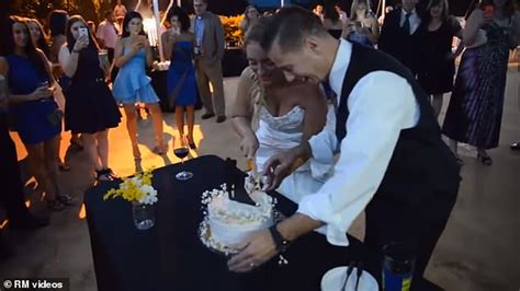 Groom Smashes Cake Into Bride S Face And Sends Her Falling To Ground