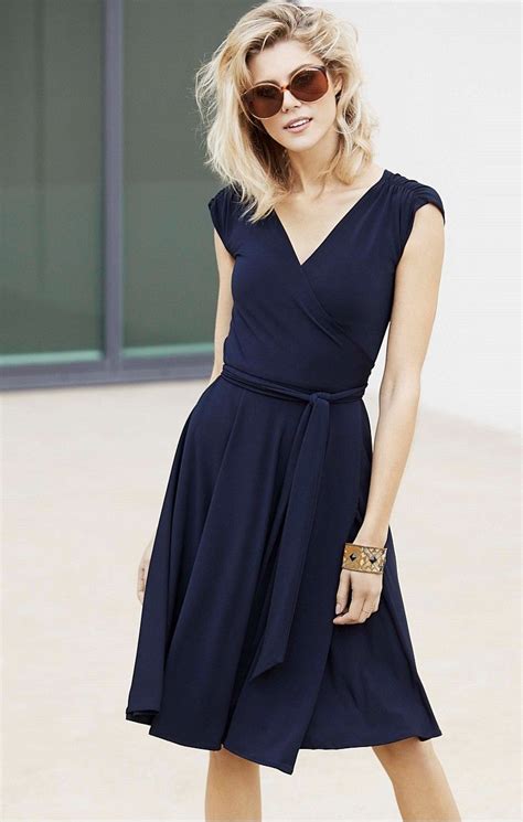 Travel Wrap Cap Sleeve Full Skirt Knee Length Jersey Dress In Navy