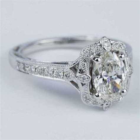 Antique Halo Designer Engagement Ring With Oval Diamond