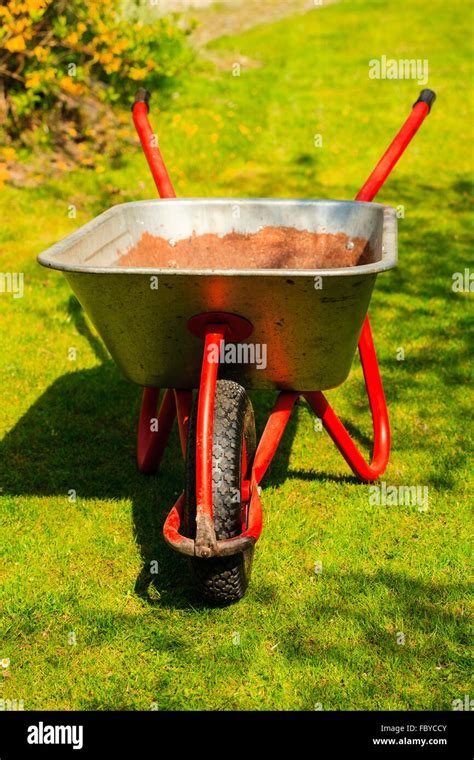 Gardening Garden Wheelbarrow With Sand Soil Stock Photo Alamy