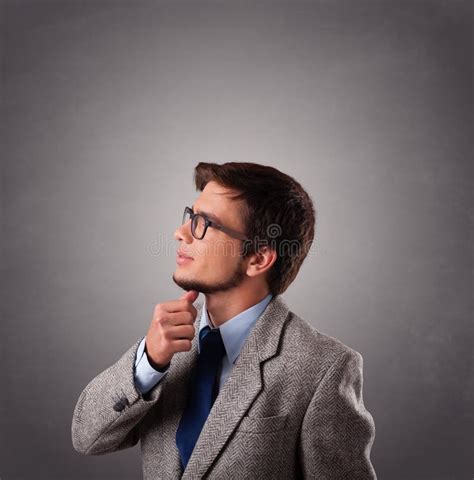 Attractive Young Man Standing And Thinking With Copy Space Stock Image