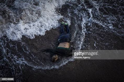 Image Depicts Death The Body Of A Refugee Is Washed Ashore On A