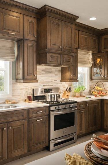 To ensure highest satisfaction regarding door styles and finishes, we suggest you view an actual sample from your nearest lowe's for best color, wood grain and finish representation. Trendy Farmhouse Kitchen Cabinets Stained Hardwood Floors ...