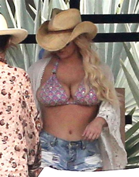 Bustin Out Jessica Simpson Nearly Pops Out Of Her Bikini And Daisy Dukes