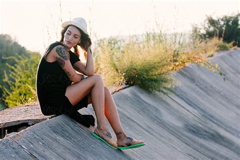 Portrait Of Beautiful Woman Relaxed Outdoor by Stocksy Contributor Susana Ramírez Stocksy