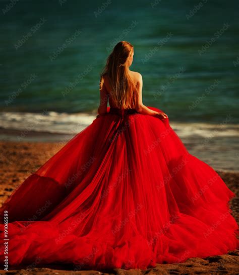 Beautiful Girl By The Sea A Woman In A Red Dress On The Beach Stock