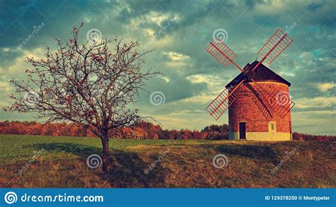 Beautiful Old Windmill Landscape Photo With Architecture At Sunset
