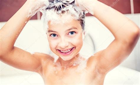 Cute Young Girl In Shower Washing Hair And Face With Shampoo Girl With