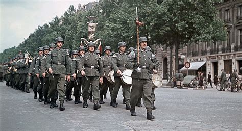 A Color Photograph Of German Troops Marching Through Occupied Paris