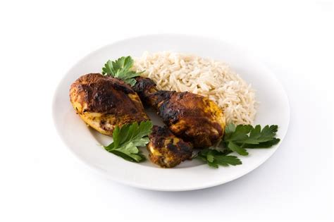 Premium Photo Roasted Tandoori Chicken With Basmati Rice In Plate On