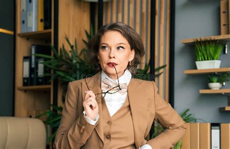 confident stylish mature middle aged elderly woman in office general manager ceo stock image