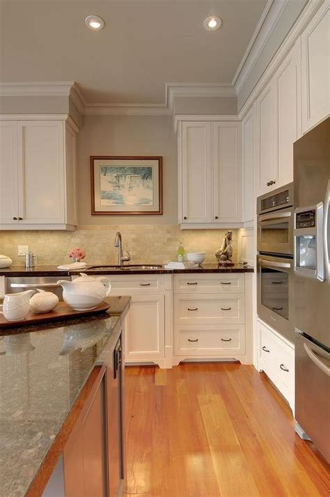 This means a move away from homogeneous stainless steel appliances, and a greater need for cabinets that can match and form adhesion between a variety of color extremes. Traditional - kitchen - Benjamin Moore Smokey Taupe CC-490 ...