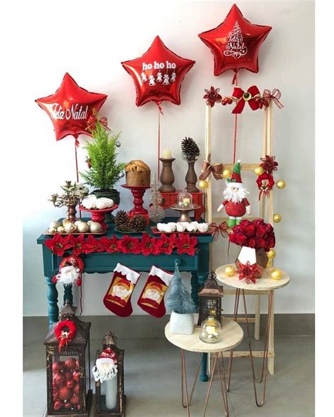 A Table With Christmas Decorations And Balloons On It