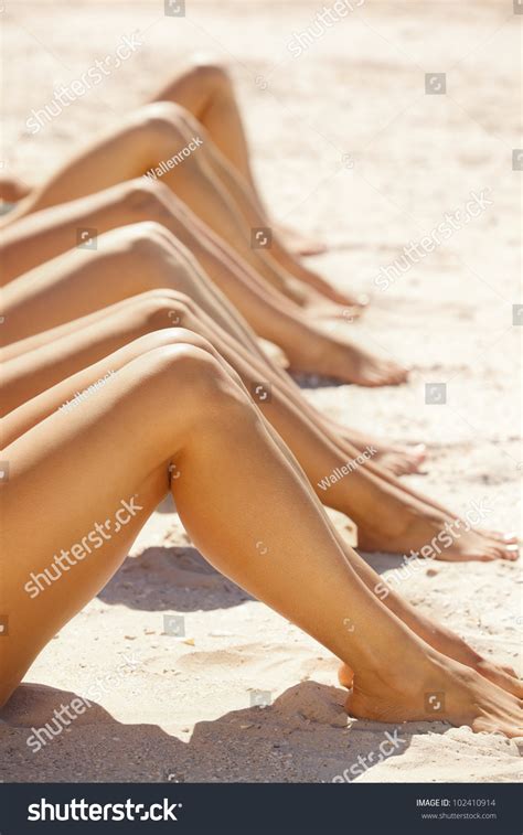 Legs Several Girls Lying On Sandy Stock Photo Shutterstock