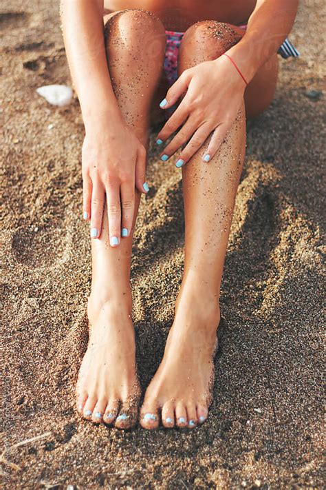 Beach Sand On Woman S Legs By Jovana Rikalo Stocksy United