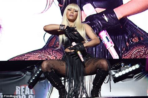 Nicki Minaj Showcases Booty In Risqué Fringe Skirt And Eye Catching