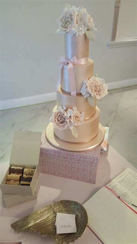 Stunning Rose Gold Wedding Cake With Blush Roses Rose Gold Wedding