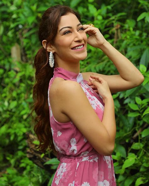 taarak bhabhis photos munmun dutta looks super hot in a green belted outfit with hoop earrings