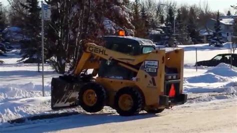 Snow Removal Edmonton Bobcat Operator In Traffic Youtube