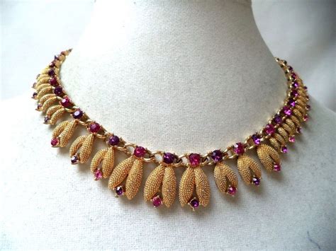 Stunning Vintage Gold Tone Signed Kramer Purple Rhinestone Floral