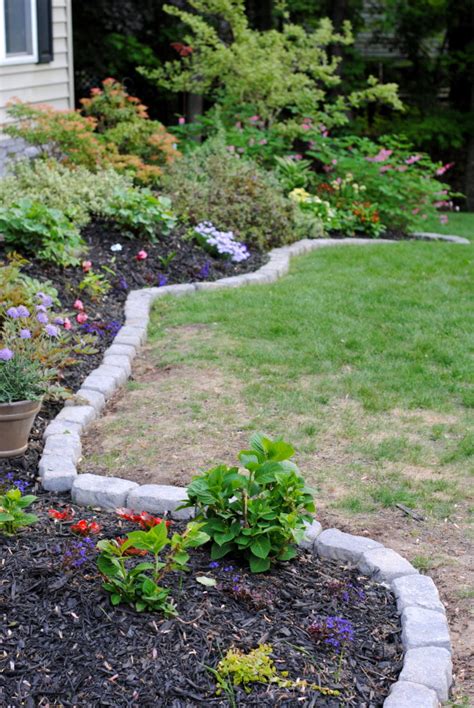 It's not real stone and it's actually made of. 10 Garden Edging Ideas With Bricks and Rocks