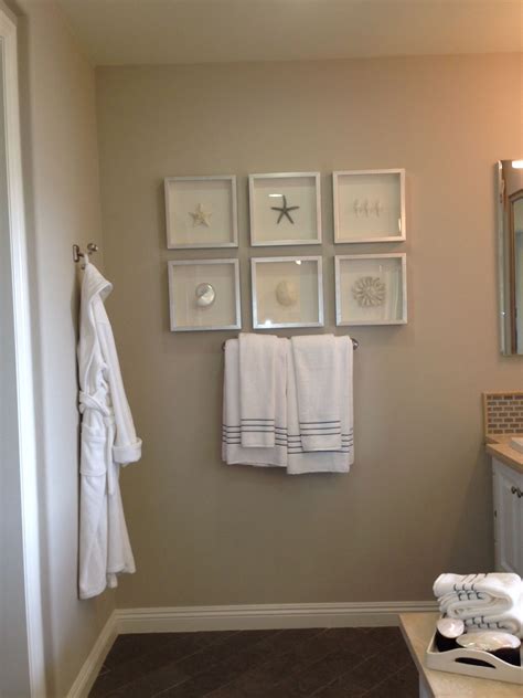 Personalize an area with gorgeous. Bathroom beach decor ( framing ideas) | Model home ...