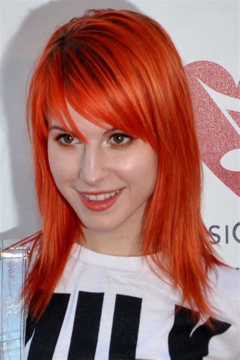 hayley williams straight orange angled sideswept bangs uneven color hairstyle steal her style