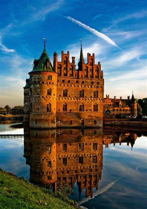Denmark is a country in scandinavia. Egeskov Castle, Denmark - | Amazing Places