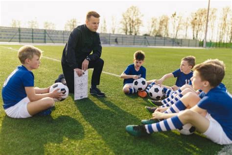 Young Boys In Sports Club On Soccer Football Training Kids Enhance