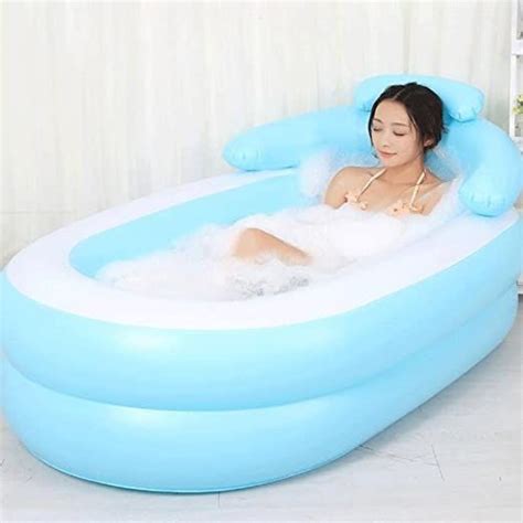 This is an inflatable tub for adults that comes with an electric air pump. ETERLY Thickened Insulated Folding Adult Inflatable ...