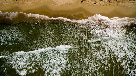 Download Wallpaper 1600x900 Sea Beach Aerial View Waves Widescreen