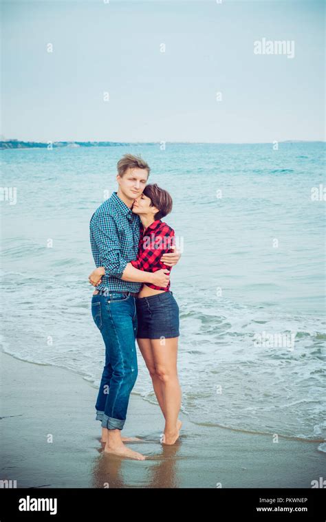 Happy Romantic Couple On The Sea Beach Embracing Each Other Concept Of Lovers Happy Moments On