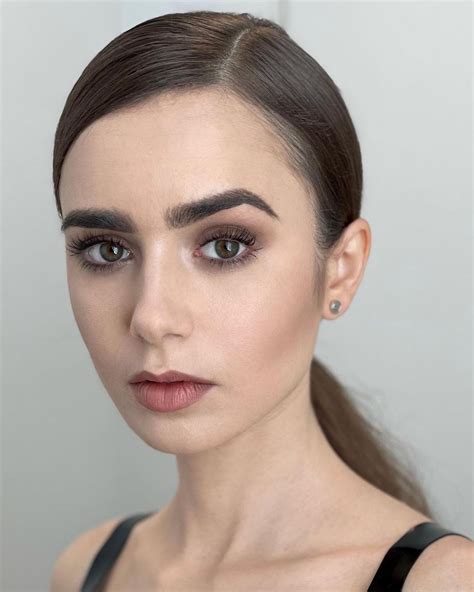 Lily Collins In Sexy Dress By Anthony Vaccarello 8 Photos The