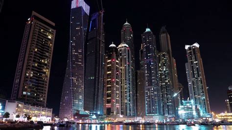 Dubai Marina night time lapse, United Arab Emirates. Dubai Marina - the largest man-made marina ...
