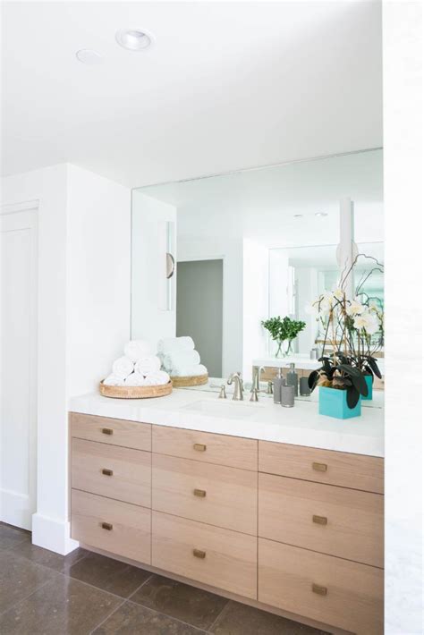 You'll no doubt spot some cheap bathroom cabinets if you head to your nearest diy store, but shopping online is far more convenient and you'll have loads of products to choose from. Emerald Bay | Light wood cabinets, Wood bathroom cabinets ...