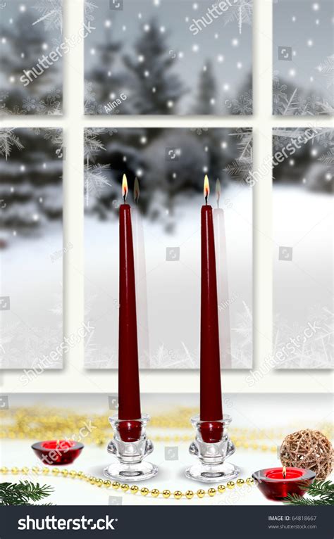 Christmas Candles In The Window With Snowy Scene In Background Stock