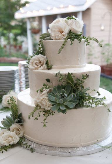 Tri Tier Round White Wedding Cake With Succulents And