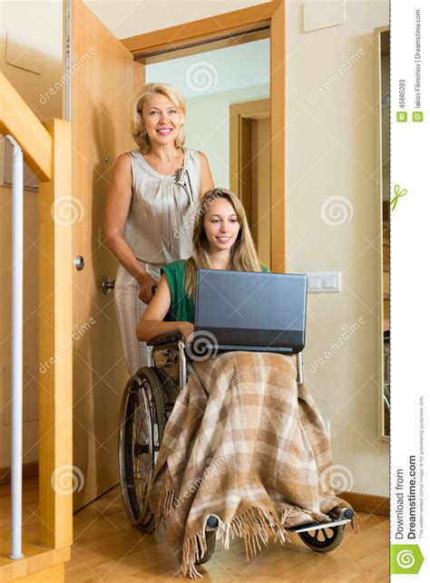 social worker and invalid with laptop stock image image of elderly casual 45885283