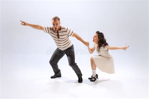 Rhythm And Expression Energetic Dance Couple In Retro Style Outfits