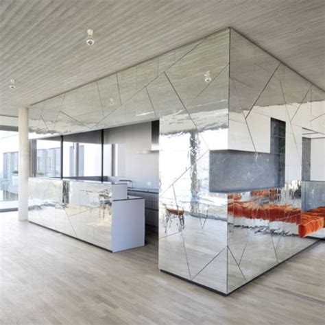 Looking for design ideas and tips? Futuristic Penthouse With Mirror Walls | DigsDigs