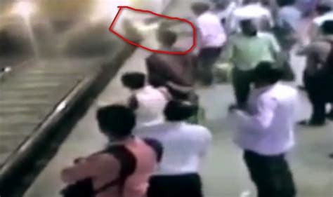 Shocking Video 24 Year Old Woman Pushed To Death Under Local Train By