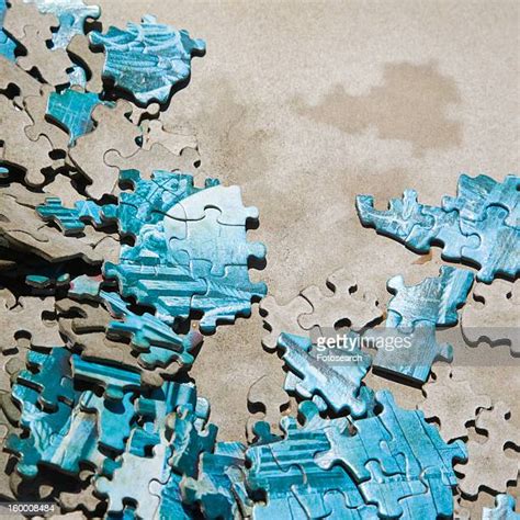 Scattered Puzzle Pieces Photos And Premium High Res Pictures Getty Images