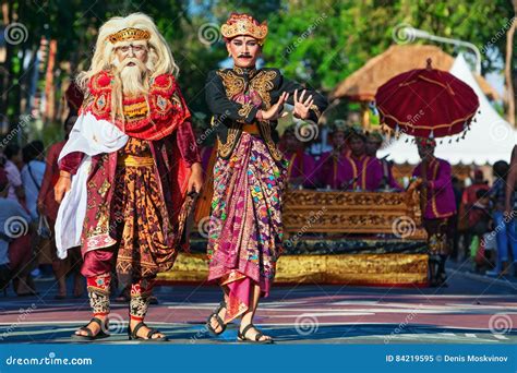 Group Of Beautiful Balinese Men Dancers In Traditional Costumes