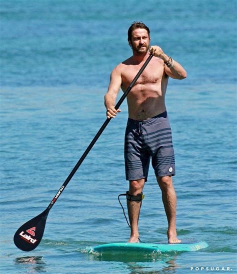 Gerard Butler Gets A Handful Of His Mystery Brunette On The Beach Gerard Butler Gerard Butler