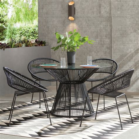 If you're looking for an outdoor seating solution that's unexpected, opt for a set of swivel chairs as well. Modern Outdoor Furniture | AllModern
