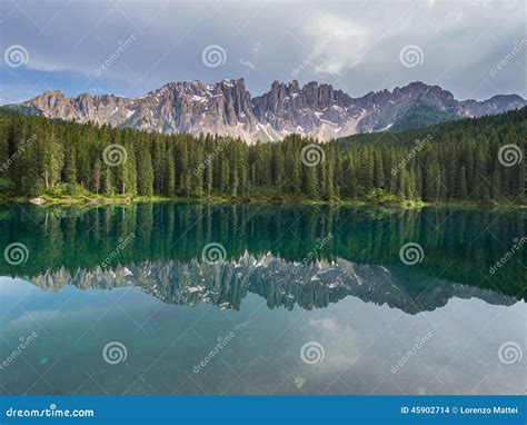 Latemar Mount And Woods Reflected In Karersee Lake Dolomites Italy