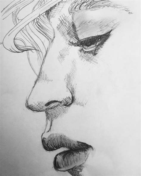 A Pencil Drawing Of A Mans Face