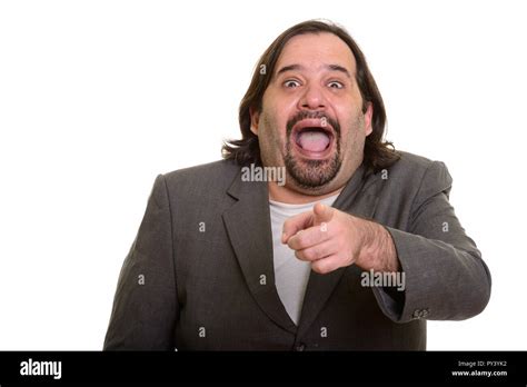 Happy Fat Caucasian Businessman Smiling While Laughing And Point Stock