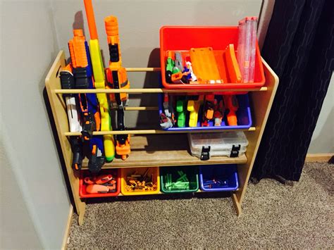 Like most 11 year olds, mine is nerf obsessed. Nerf gun shelf | Creative toy storage, Nerf gun storage