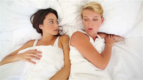 Lesbian Couple Having An Argument In Bed Stock Video Footage